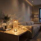 Rose diamond faceted LED table lamp glowing warm on a modern living room side table