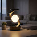 Rotating moon desk lamp with floating glowing orb on a modern desk, phone charging on the base