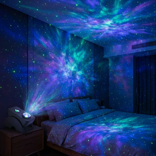 Galaxy projector filling a dark bedroom with green stars and blue nebula clouds